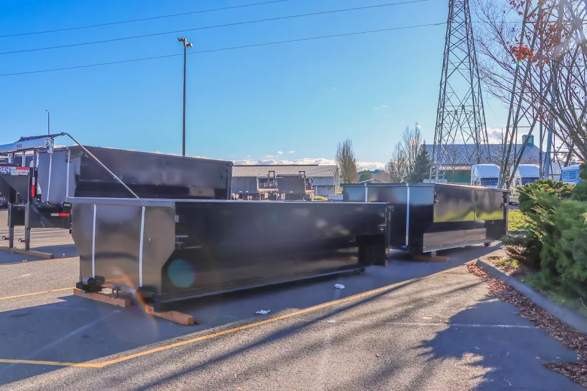 Roll-off dumpster ready for waste disposal at job site for Demolition Dumpster Rental in Pike Creek